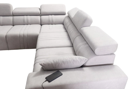 Narożnik z funkcją spania Castel III Lux beżowy prawostronny niezwykle komfortowy narożnik do salonu z wysuwanym podnóżkiem