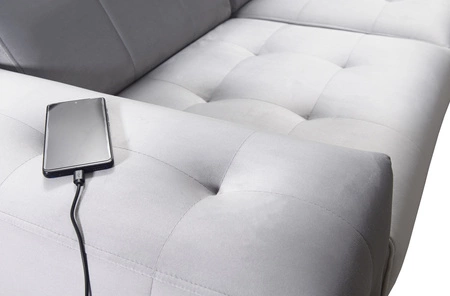 Narożnik z funkcją spania Hampton VII czarny prawostronny narożnik do pokoju wykonany z aksamitnej tkaniny o gładkiej powierzchni