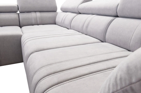 Narożnik z funkcją spania Castel VII błękitny lewostronny stylowy narożnik z pojemnikiem na pościel i regulowanymi zagłówkami