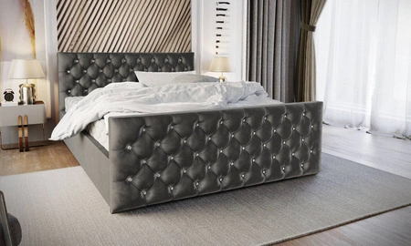 Łóżko tapicerowane Uberaba 140x200 szare z pojemnikiem w nowoczesnym skandynawskim stylu z pikowanym wezgłowiem i zanóżkiem z kryształkami