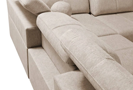 Narożnik z funkcją spania Tesalia X zielony prawostronny nowoczesny i komfortowy narożnik z innowacyjną funkcją przesuwanego oparcia