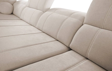 Narożnik z funkcją spania Cetara XII kremowy lewostronny stylowy design komfortowe przesuwane oparcia dwa pojemniki na pościel