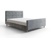 Łóżko tapicerowane Isara 140x200 jasny szary z pojemnikiem w nowoczesnym skandynawskim stylu z charakterystycznym wezgłowiem oraz z zanóżkiem