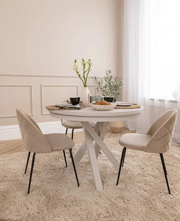 Stół okrągły rozkładany Malumi 100 cm beżowy funkcjonalny stół do jadalni doskonale dopasuje się do wnętrz w stylu nowoczesnym