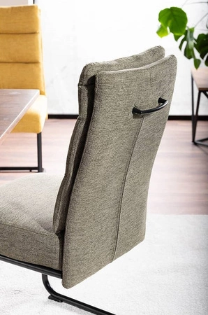 Krzesło tapicerowane Berry oliwkowe nowoczesne oraz funkcjonalne krzesło do jadalni z metalowymi płozami krzesło z uchwytem