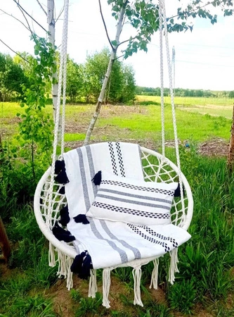 Fotel wiszący Nido ecru wykonany z plecionej liny fotel wiszący bocianie gniazdo idealnie dopasuje się do aranżacji w stylu boho