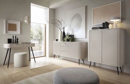 Komoda Zoya 103 cm beżowa elegancki design owalny kształt bryły osadzony na czarnych metalowych nogach gustowny ryflowany front