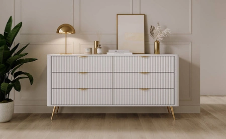 Komoda z szufladami Lante 163 cm biała elegancki design owalny kształt komody osadzona na wysokich nogach gustowny ryflowany front