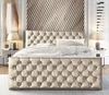Łóżko tapicerowane Uberaba 160x200 beżowe z pojemnikiem w nowoczesnym skandynawskim stylu z pikowanym wezgłowiem i zanóżkiem z kryształkami