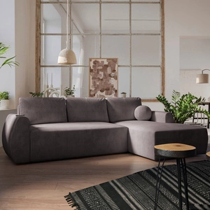 Narożnik z funkcją spania Colio brązowy prawostronny stylowy narożnik o ciekawym kształcie welurowa tkanina ozdobna poduszka piłka