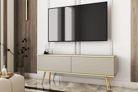 Szafka RTV Luxury 135 cm beżowa elegancki design stylowy ryflowany front korpus zwieńczony złotą listwą złote metalowe nogi