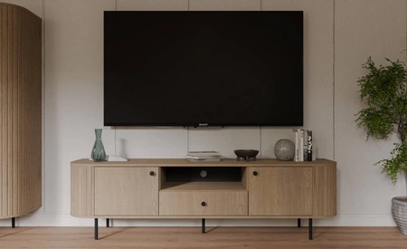 Szafka RTV Ovalio 181 cm dąb cremona nietuzinkowa szafka pod telewizor do salonu metalowe dodatki dekoracyjne frezowania