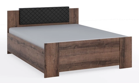 Nakładka tapicerowana na zagłówek łóżka Rico czarna funkcjonalny i wygodny dodatek do łóżka pikowany zagłówek