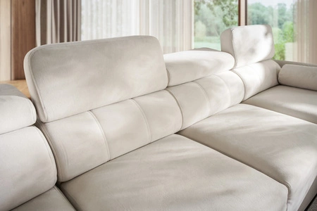 Narożnik z funkcją spania Cantare X łososiowy prawostronny wygodny narożnik o niebanalnym designie doskonały do przestronnego salonu