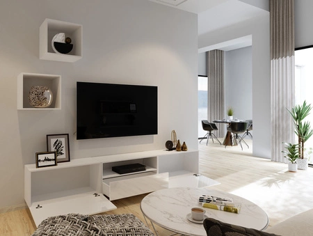 Meblościanka Mistra biała / biały połysk uniwersalna i stylowa meblościanka do salonu minimalistyczny design w nowoczesnej aranżacji