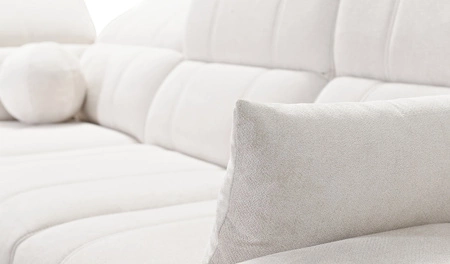 Narożnik z funkcją spania Penejos VII łososiowy lewostronny stylowy narożnik z pojemnikiem na pościel wygodne regulowane zagłówki