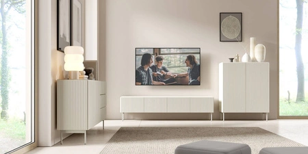 Komoda z szufladami Muti 147 cm beżowa stylowa komoda z designerskim ryflowaniem wysokie nogi podkreślają elegancką stylistykę