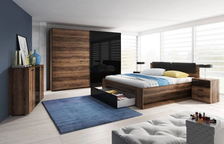 Łóżko z szufladą Galaxy 180x200 cm dąb monastery / czarny połysk to idealne łóżko do sypialni z częściowo tapicerowanym zagłówkiem