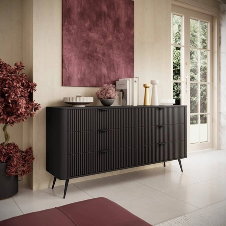 Komoda z szufladami Lante 163 cm czarna elegancki design owalny kształt komody osadzona na wysokich nogach gustowny ryflowany front