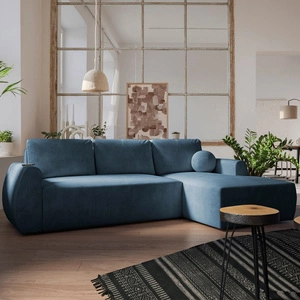 Narożnik z funkcją spania Colio niebieski prawostronny stylowy narożnik o ciekawym kształcie welurowa tkanina ozdobna poduszka piłka