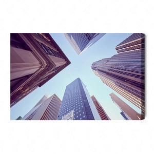 Obraz na płótnie nowojorskie wieżowce 100x70 cm ponadczasowa ozdoba wnętrza obraz w wyrazistej kolorystyce wysoka jakość wykonania