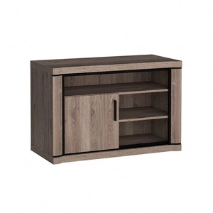 Szafka RTV Dallas 107 cm dąb truflowy / czarny elegancka stylistyka mebla wzbogacona o stylowe czarne dodatki szafka z drzwiami