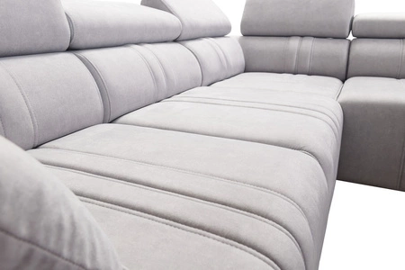 Narożnik z funkcją spania Castel II Lux beżowy prawostronny wygodny narożnik do salonu z komfortowym wysuwanym podnóżkiem