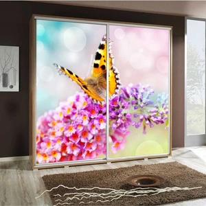 Szafa przesuwna Artistino 205 cm z grafiką motyl korpus szafy w kolorze dąb catania wykonany z płyty o grubości 22mm