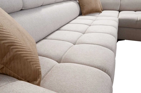 Narożnik z funkcją spania Bolmso II musztardowy prawostronny narożnik z pojemnikiem na pościel szuflada z pełnym wysuwem w boczku mebla