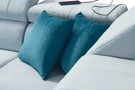 Narożnik z funkcją spania Rava VI lazurowy prawostronny praktyczny i nowoczesny narożnik wyposażony w wielofunkcyjną lampkę