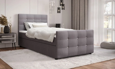 Łóżko kontynentalne Kansas 120x200 szare w nowoczesnym skandynawskim stylu z tapicerowanym zagłówkiem oraz zanóżkiem