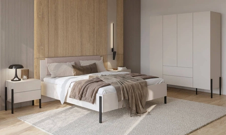 Łóżko Jukon S 180x200 cm beżowe gustowna forma mebla w nowoczesnym stylu łóżko do sypialni na metalowych czarnych nogach z tapicerowanym zagłówkiem