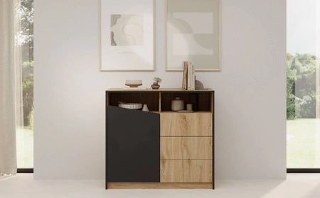 Komoda z szufladami Atson 100 cm dąb odwieczny / czarny lewa stylowy design komody ciekawy kształt frontu nadaje oryginalności