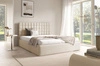 Łóżko tapicerowane Graso 140x200 kremowe nowoczesne i eleganckie łóżko gustowny symetryczny wzór na wezgłowiu pojemnik na pościel