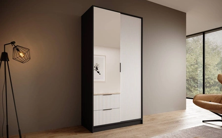 Szafa z lustrem Norel 102 cm czarny / biały stylowa szafa o nowoczesnym designie z ryflowanymi frontami i pojemnymi szufladami