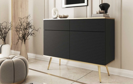 Komoda z szufladami Luxury 107 cm czarna stylowa komoda z ryflowanymi frontami korpus zwieńczony złotą listwą złote metalowe nogi