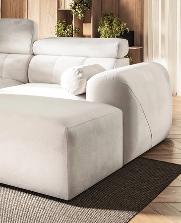 Narożnik z funkcją spania Cantare IV Lux kość słoniowa prawostronny starannie wykonany narożnik do salonu z podnoszonym podnóżkiem