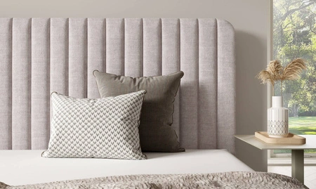 Łóżko tapicerowane Faro 160x200 granatowe wygodne łóżko do sypialni designerskie wezgłowie o subtelnie zaokrąglonym kształcie