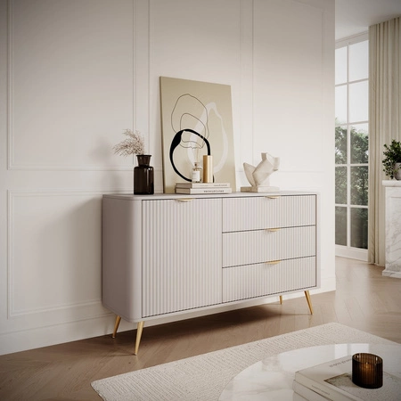 Komoda z szufladami Lante 138 cm beżowa elegancka komoda o zaokrąglonym kształcie wsparta na metalowej podstawie stylowe uchwyty