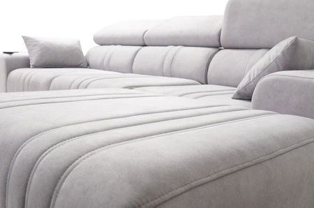 Narożnik z funkcją spania Castel błękitny prawostronny komfortowy i stylowy narożnik rozkładany z pojemnikiem na pościel