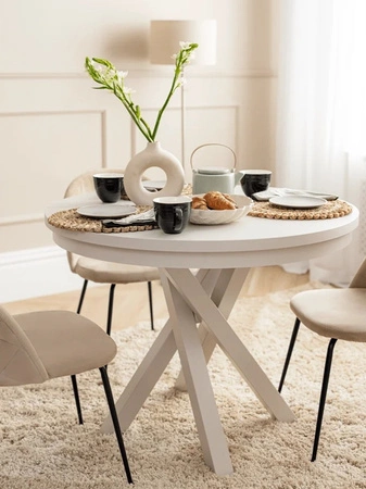 Stół okrągły rozkładany Malumi 100 cm beżowy funkcjonalny stół do jadalni doskonale dopasuje się do wnętrz w stylu nowoczesnym