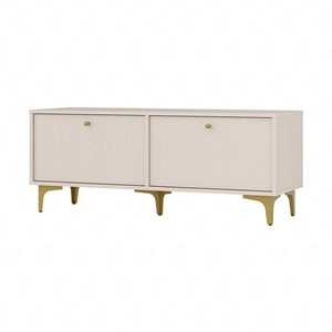 Szafka RTV Kioto I 121 cm beżowa elegancka szafka z drzwiami otwieranymi do dołu stonowana kolorystyka złote dodatki