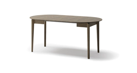 Stół okrągły rozkładany Plot 90 cm dąb ciemny funkcjonalny stół o niewielkich rozmiarach idealnie dopasuje się do mniejszych wnętrz