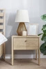 Szafka nocna Cozy dąb olejowany modna szafka z szufladą do sypialni w stylu klasycznym bryła wsparta na wysokich smukłych nogach