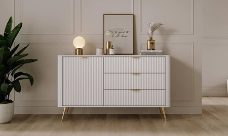 Komoda z szufladami Lante 138 cm biała elegancka komoda o zaokrąglonym kształcie wsparta na metalowej podstawie stylowe uchwyty