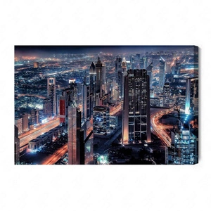 Obraz na płótnie Dubaj nocą 100x70 cm ponadczasowa ozdoba każdego wnętrza obraz w wyrazistej kolorystyce wysoka jakość wykonania