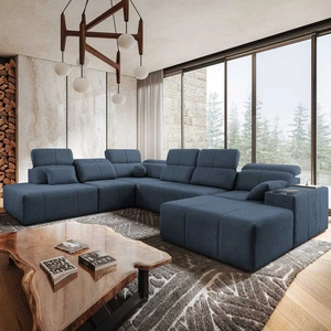 Narożnik z funkcją spania Tesalia X niebieski prawostronny nowoczesny i komfortowy narożnik z innowacyjną funkcją przesuwanego oparcia