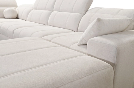 Narożnik z funkcją spania Penejos IV Lux kremowy prawostronny stylowy narożnik rozkładany z komfortowym wysuwanym podnóżkiem