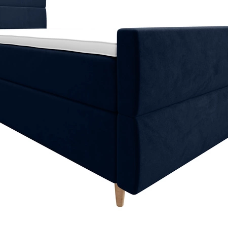 Łóżko kontynentalne Benet 120x200 granatowe w nowoczesnym skandynawskim stylu z tapicerowanym zagłówkiem oraz zanóżkiem łóżko z pojemnikiem