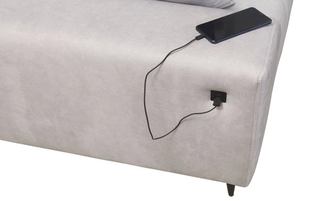 Narożnik z funkcją spania Castel IV różowy prawostronny stylowy narożnik z pojemnikami na pościel i regulowanymi zagłówkami